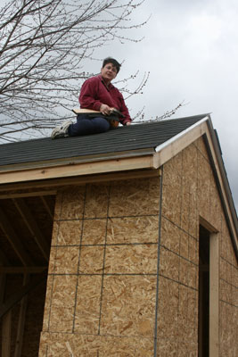 Laurie finishing up the shingling